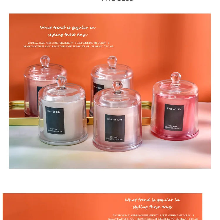 شمعة معطرة في كوب زجاجي.