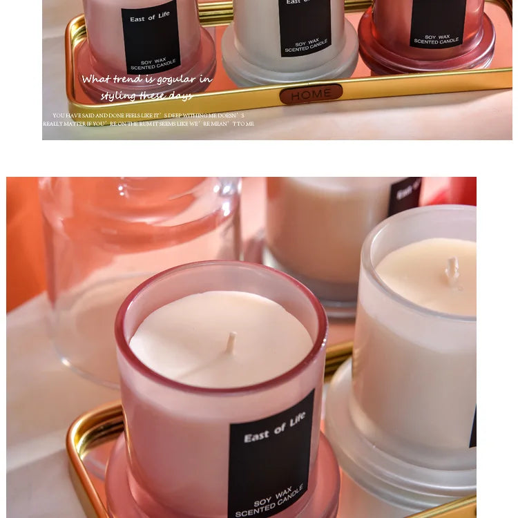 شمعة معطرة في كوب زجاجي.
