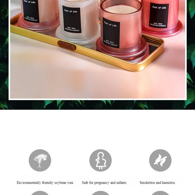 شمعة معطرة في كوب زجاجي.