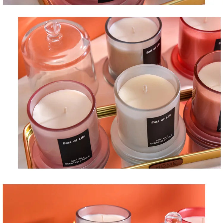 شمعة معطرة في كوب زجاجي.