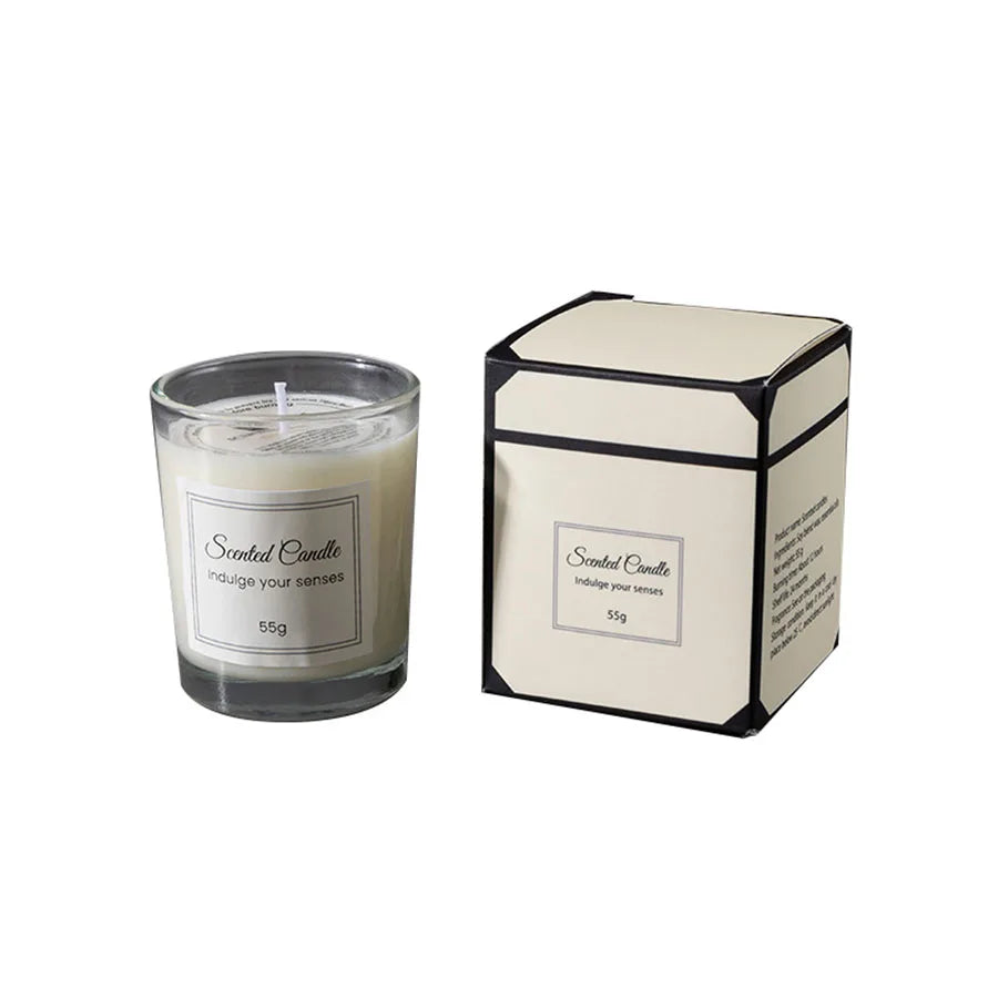 شمعة معطرة في كوب زجاجي.