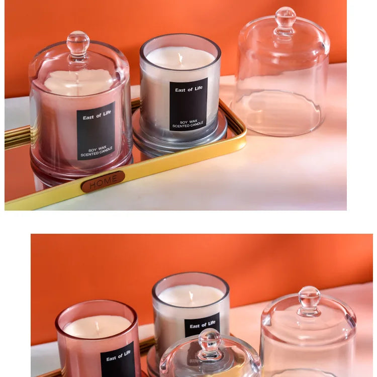 شمعة معطرة في كوب زجاجي.