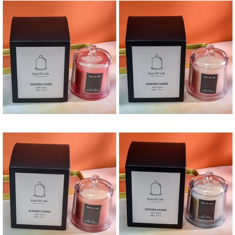 شمعة معطرة في كوب زجاجي.