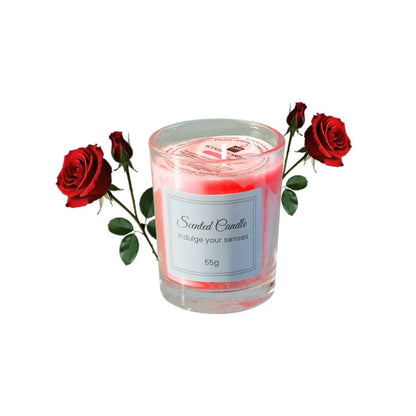 شمعة معطرة في كوب زجاجي.