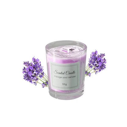 شمعة معطرة في كوب زجاجي.